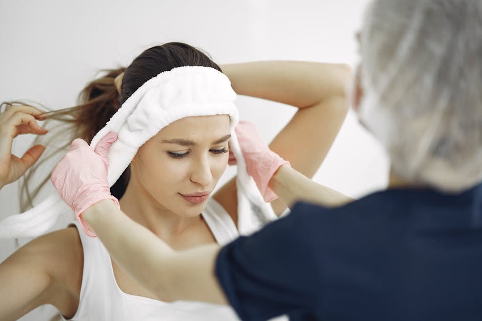 Seborrheic Dermatitis Hair Loss Treatment & Regrowth Guide 2026 - A woman in a spa getting a facial treatment with assistance from a professional.