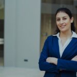 The 6 Best Topical Steroids for Seborrheic Dermatitis: How They Work and What to Expect - Professional woman in a blue suit smiling confidently in an office setting.