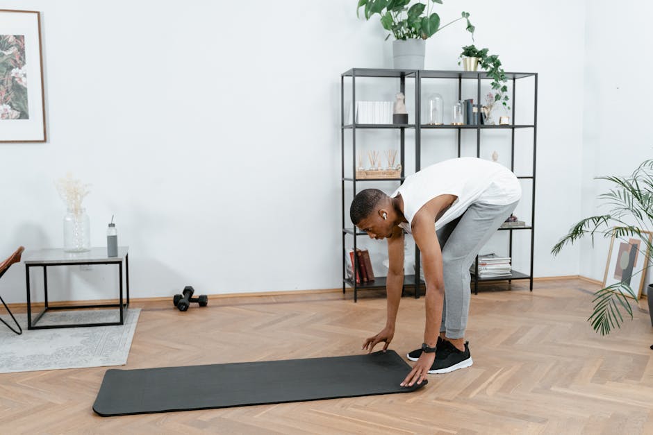 Can Exercise Prevent Seborrheic Dermatitis? What the 2026 Research Shows - Black man practicing yoga indoors with mat, promoting healthy lifestyle and body care.