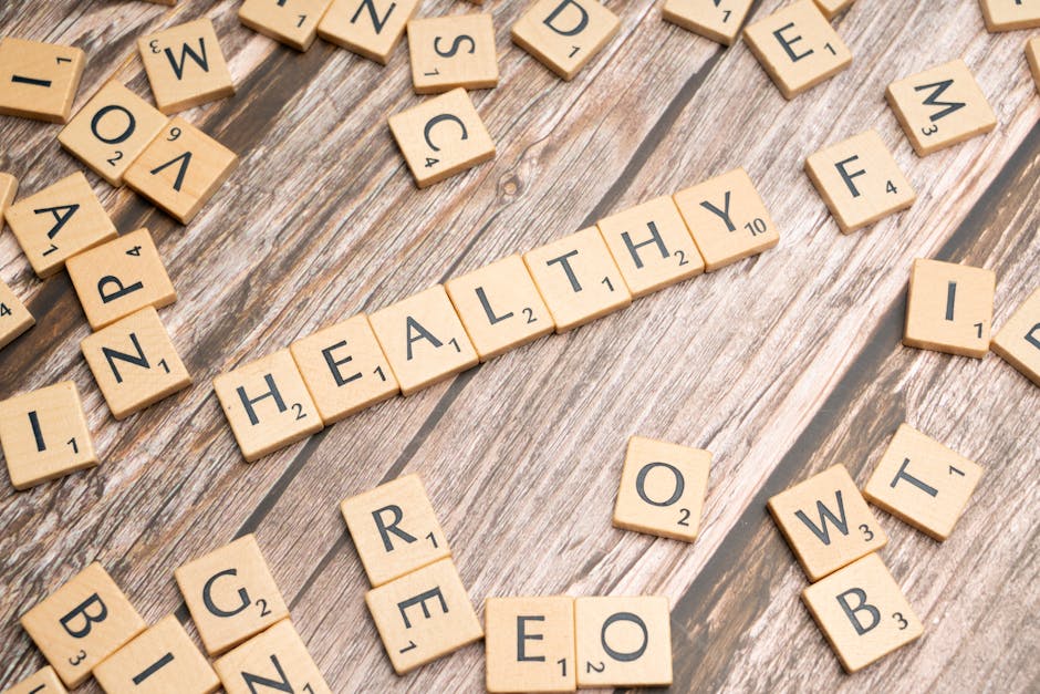 cortizone-10-maximum-strength-intensive-healing-itch-relief-lotion-review-2026-complete - Wooden letter tiles arranged on a wooden surface spelling out 'healthy', symbolizing wellness.