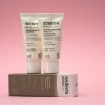 Dermoscribe Seborrheic Dermatitis Cream Review: Sulfur + Salicylic Acid Formula Analyzed (2026) - Two Sesderma Retises antiwrinkle creams on a pink background, emphasizing skincare.