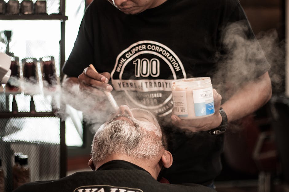 seborrheic-dermatitis-hair-loss-treatment-regrowth-2026-final - Close-up of a relaxed man receiving beard care in a traditional barbershop setting.
